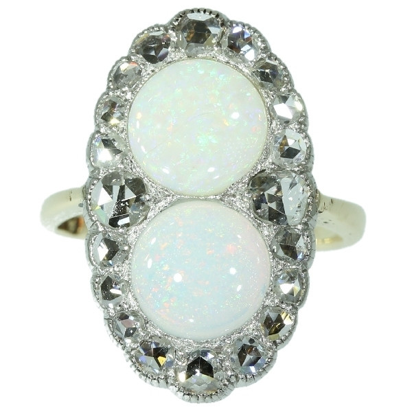 Antique Victorian engagement ring with rose cut diamonds and cabochon opals by Unknown artist