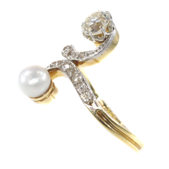 Elegant Belle Epoque diamond and pearl engagement ring so called toi et moi by Artista Sconosciuto