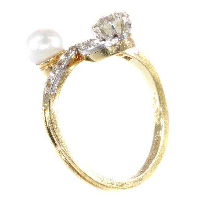 Elegant Belle Epoque diamond and pearl engagement ring so called toi et moi by Artista Desconocido
