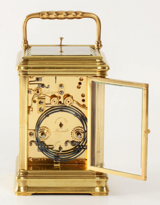 A French porcelain mounted gilt carriage clock,circa 1880 by Artista Desconocido