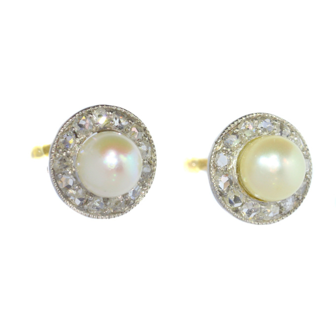 Antique diamond and pearl earstuds by Artista Desconhecido