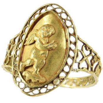 Large Antique French love and luck gold ring with cute little Amor by Unknown Artist