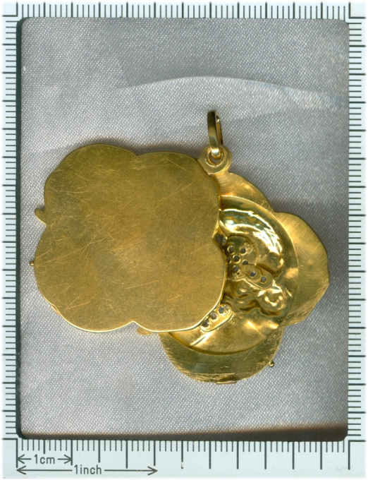 Art Nouveau gold pendant lucky clover with womans head set with rose cut diamond by Unknown Artist