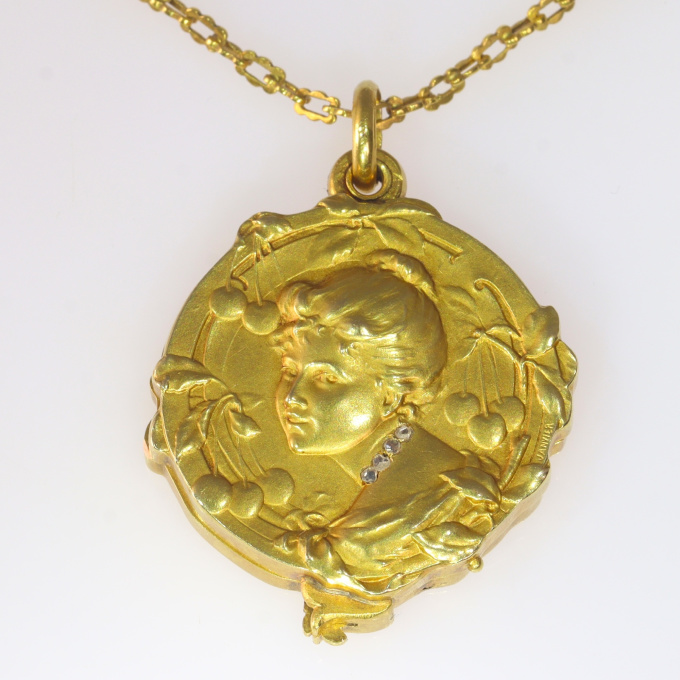 French gold chain and locket with rose cut diamonds depictging a woman, late 19th Century signed Janvier by Artiste Inconnu