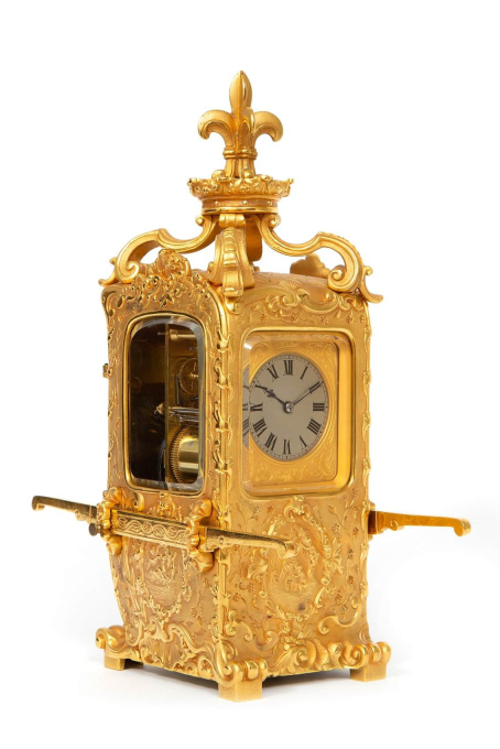 A French gilt brass 'sedan chair' carriage clock, circa 1870 by Artista Desconocido