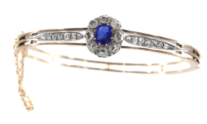 Antique Victorian gold bangle set with diamonds and blue strass by Unknown Artist