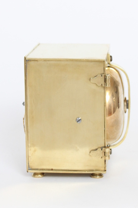 A rare and small German brass travel alarm clock with travel case, circa 1770 by Artista Sconosciuto