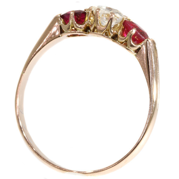 Antique ring with old mine brilliant cut diamond and two red strass stones by Artiste Inconnu