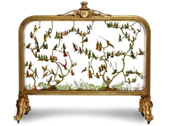 AN EXCEPTIONAL AND EXTREMELY RARE VICTORIAN GILT-WOOD FIRE SCREEN WITH TAXIDERMY HUMMINGBIRDS  by Unknown Artist
