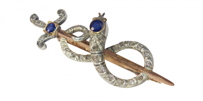 Antique gold diamond and sapphire brooch snake wrapped around sword or dagger by Artista Sconosciuto
