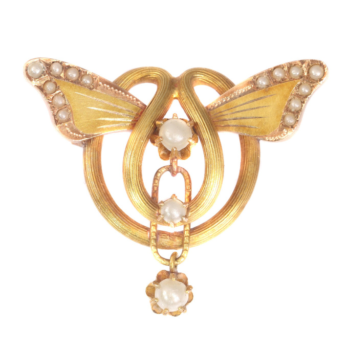 Antique gold brooch with butterfly wings set with half seed pearls by Unknown artist