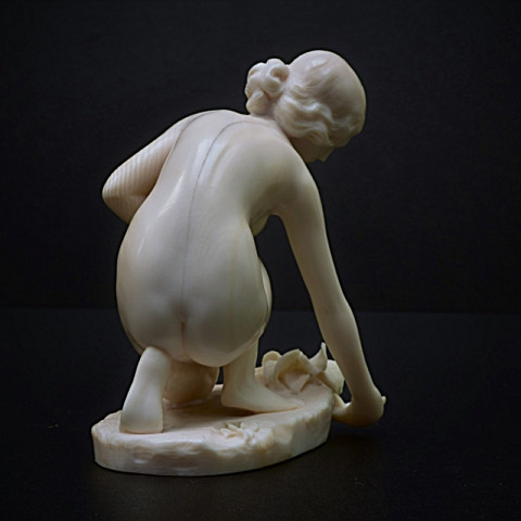 Art deco ivory sculpture Nude girl with shell  by C.H Middegaels