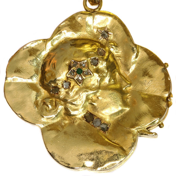 Antique Art Nouveau good luck charm locket with four leaf clover woman's head by Artista Desconhecido