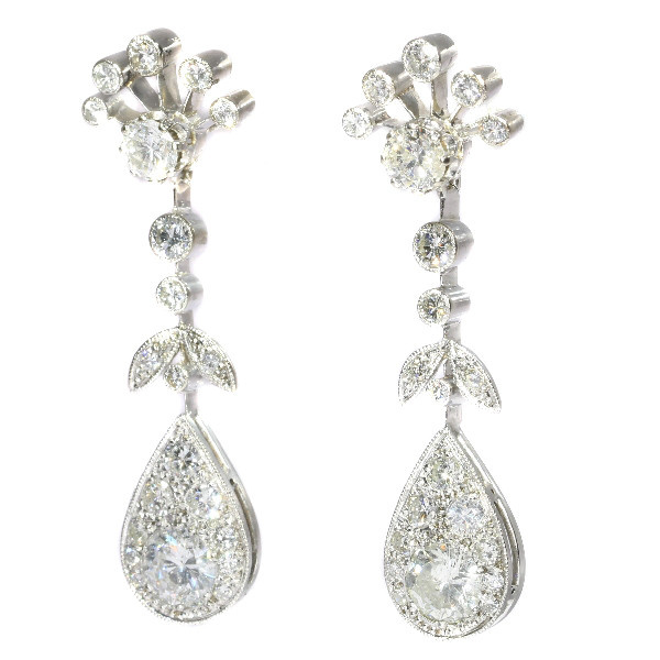 Vintage long pendent platinum cocktail ear jewels abundantly set with diamonds by Unknown artist