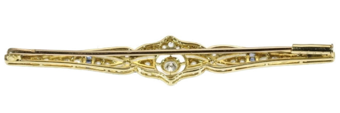 Art Deco diamond and sapphire bar brooch by Artista Sconosciuto