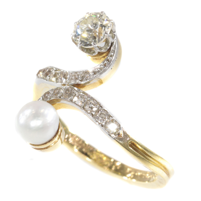 Elegant Belle Epoque diamond and pearl engagement ring so called toi et moi by Artista Sconosciuto