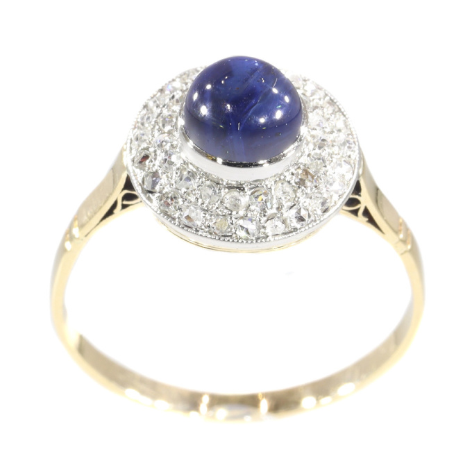 Vintage Art Deco diamond and high domed cabochon sapphire ring by Artista Sconosciuto