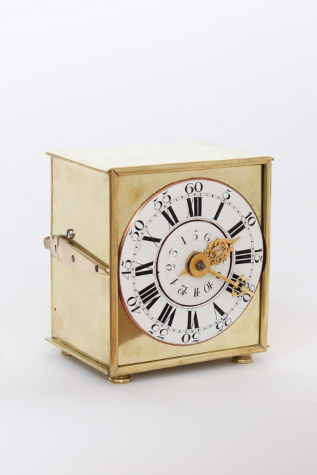 A rare and small German brass travel alarm clock with travel case, circa 1770 by Onbekende Kunstenaar