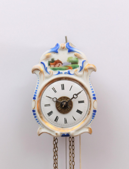 A small German polychrome striking and alarm wall clock, circa 1860 by Unknown artist
