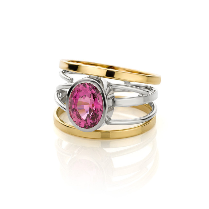 Yellow and white gold ring with a 'hot pink' sapphire by Sabine Eekels