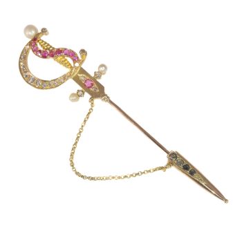 Antique gold pin in the shape of a bejeweld sword by Artista Desconocido