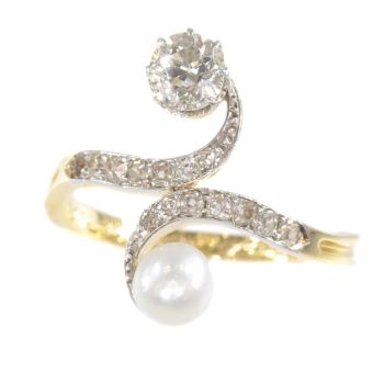 Elegant Belle Epoque diamond and pearl engagement ring so called toi et moi by Unknown Artist