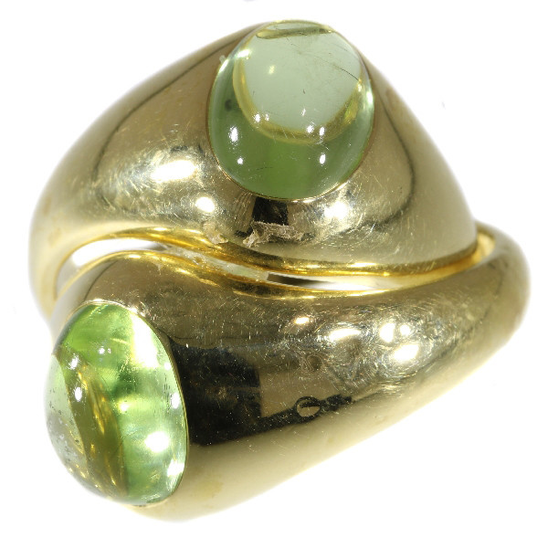 Original intertwined gold Pomellato rings with green garnets - demantoid by Unknown artist