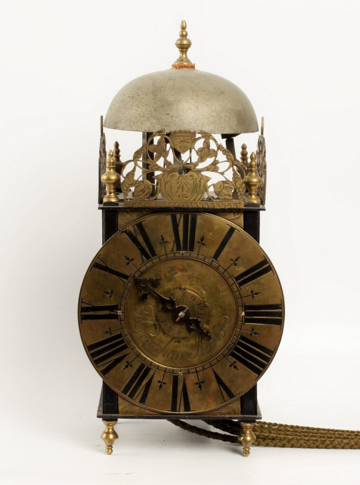 A French iron and brass lantern clock by Couchon A Paris, circa 1725 by I. Couchon A Paris