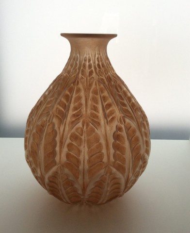A very attractive vase Malesherbes in orange patine by René Lalique
