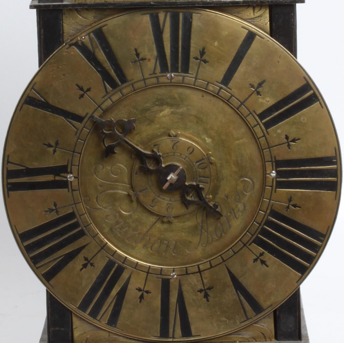 A French iron and brass lantern clock by Couchon A Paris, circa 1725 by I. Couchon A Paris