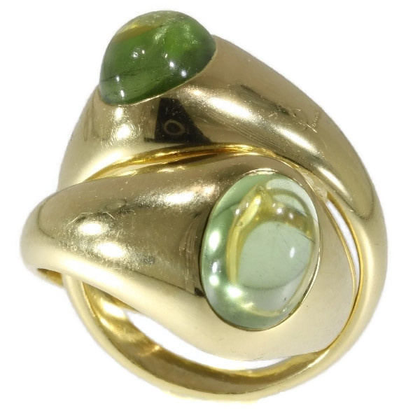 Original intertwined gold Pomellato rings with green garnets - demantoid by Onbekende Kunstenaar