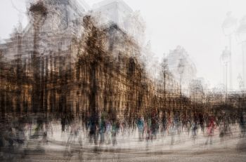 The Louvre surrounded by people by Jack Marijnissen