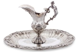 A magnificent Portuguese-colonial Brazilian silver ewer and basin by Artista Desconocido