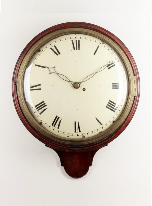 A fine English mahogany dial wall timepiece, circa 1820. by Artiste Inconnu