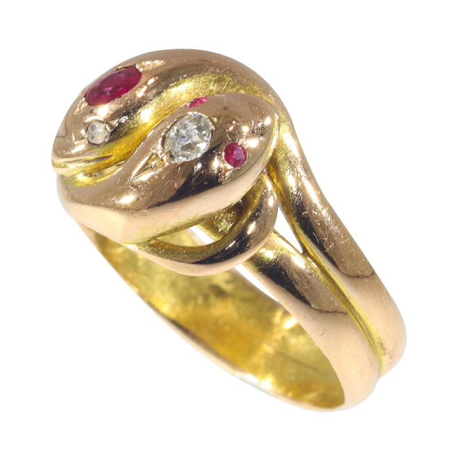 Vintage antique 18K gold double snake ring set with diamonds and rubies by Artista Desconocido