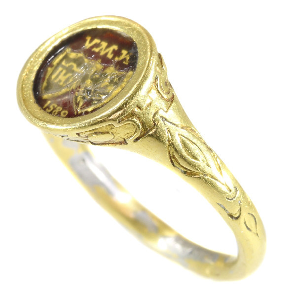 Renaissance brotherhood ring with two coat of arms behind transparant window by Artista Desconhecido