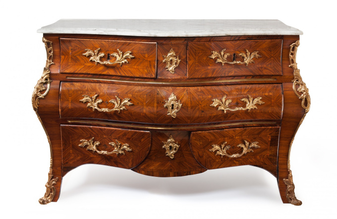 A French Louis Quinze ormolu mounted bombe commode by Artiste Inconnu