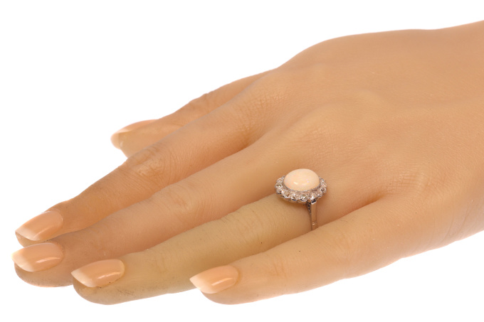 Vintage diamond and opal platinum engagement ring by Onbekende Kunstenaar