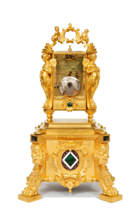 An important French malachite mounted exhibition travel clock by Paul Garnier, circa 1845 by Paul Garnier Paris