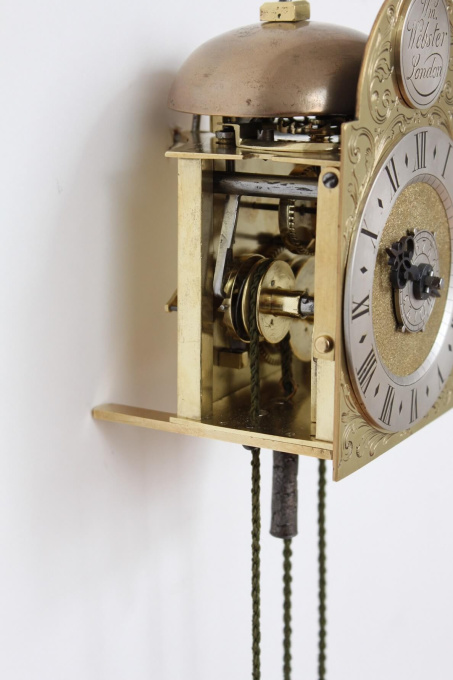 A rare and small English brass travel wall clock, William Webster London, circa 1730 by William Webster London
