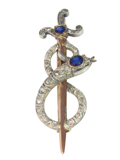 Antique gold diamond and sapphire brooch snake wrapped around sword or dagger by Artista Desconocido