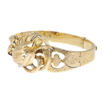 Antique gold bangle with large tulip motive by Unknown Artist
