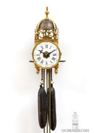 A rare miniature French brass striking and alarm lantern clock, circa 1750 by Artista Desconocido