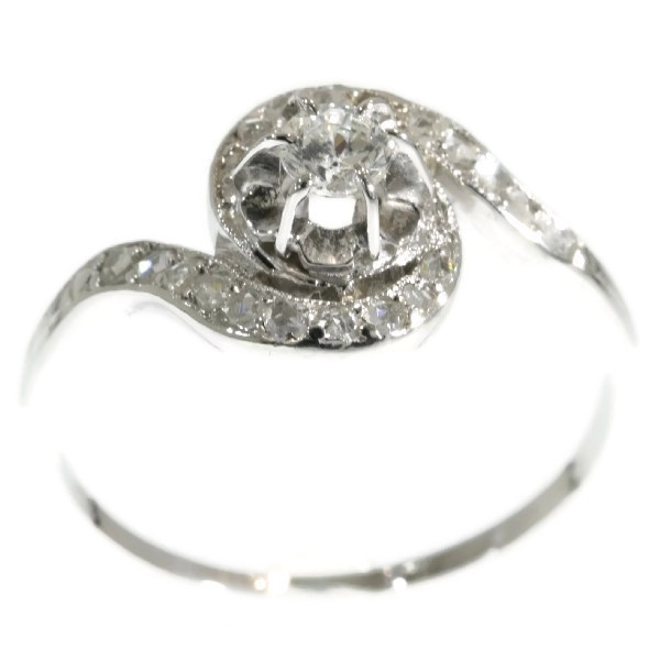 Art Deco curled up platinum ring with diamonds by Unknown artist